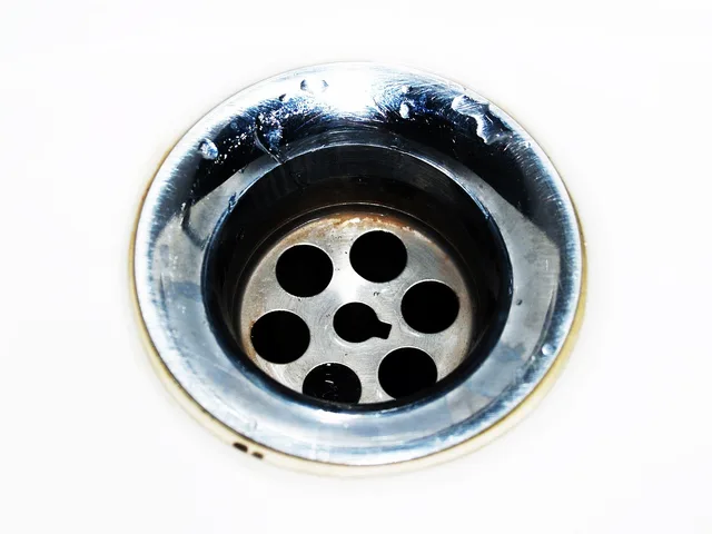 drain, cleaning, water, down, sink, steel, stainless, kitchen, household, home, squander, plug, hole, tableware, resources, closeup, pipe, dirty, nobody, discharge, plumbing, liquid, loss, sanitary, bright, head, circle, stream, jet, flush, abstract, flowing, fragment, drop, shiny, dishes, swirl, motion, washing, pour, house, cleanliness, running, domestic, concepts, metal. How the National Plumbing Code shapes drain work for Canadian contractors