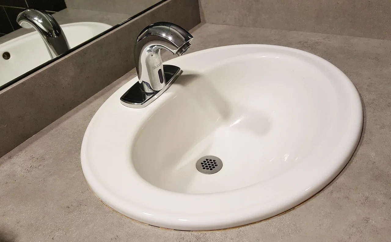basin, sink, tap, drain, faucet, bathroom, bathroom sink, plumbing, bathroom interior, reflection, brown bathroom, brown interior, basin, sink, sink, sink, sink, sink, bathroom, bathroom, bathroom sink, plumbing, plumbing. Plumber insurance requirements for drain cleaning contractors