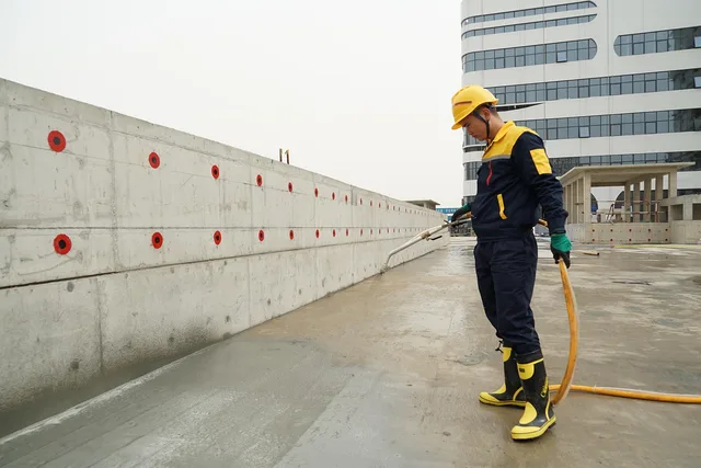 waterproofing, workers, construction site, roof top, men, working, spraying, safety gear, pressure spray, waterproofing, waterproofing, waterproofing, waterproofing, waterproofing. Quarterly self-audit for a plumbing contractor business