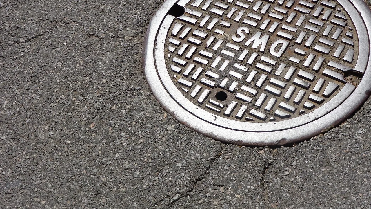 manhole, city, street, sewer, sewage, infrastructure, road, construction, gray, industrial, asphalt, pavement, industry, manhole, sewer, sewer, sewer, sewer, sewer, sewage, sewage. What Does a Sewer Camera Inspection Cost for Drain Contractors?